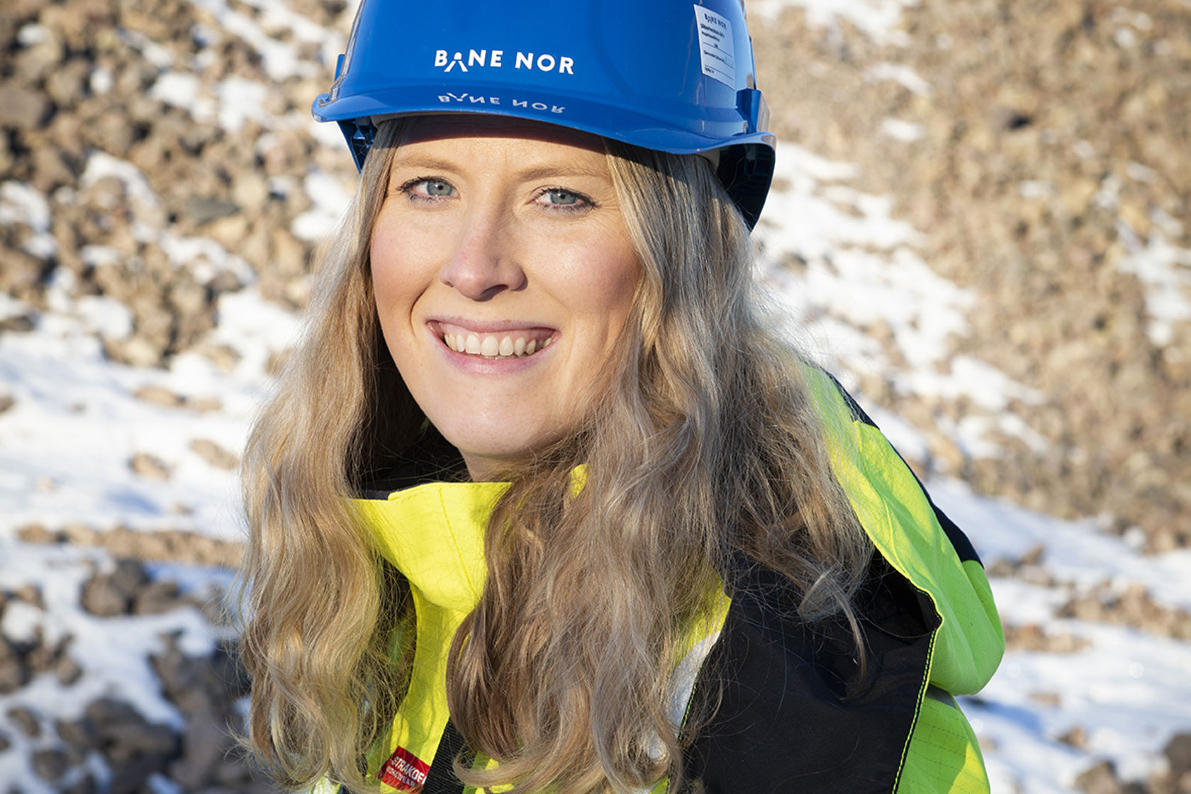 Portrettbilde av Emilie Enger Aas iført vernetøy. 