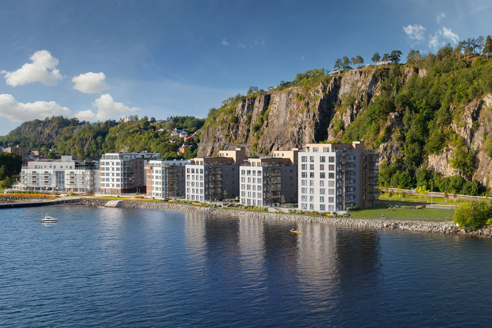 Illustrasjon av tre boligblokker ved fjorden